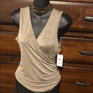 Beautiful top! Beading around the neck